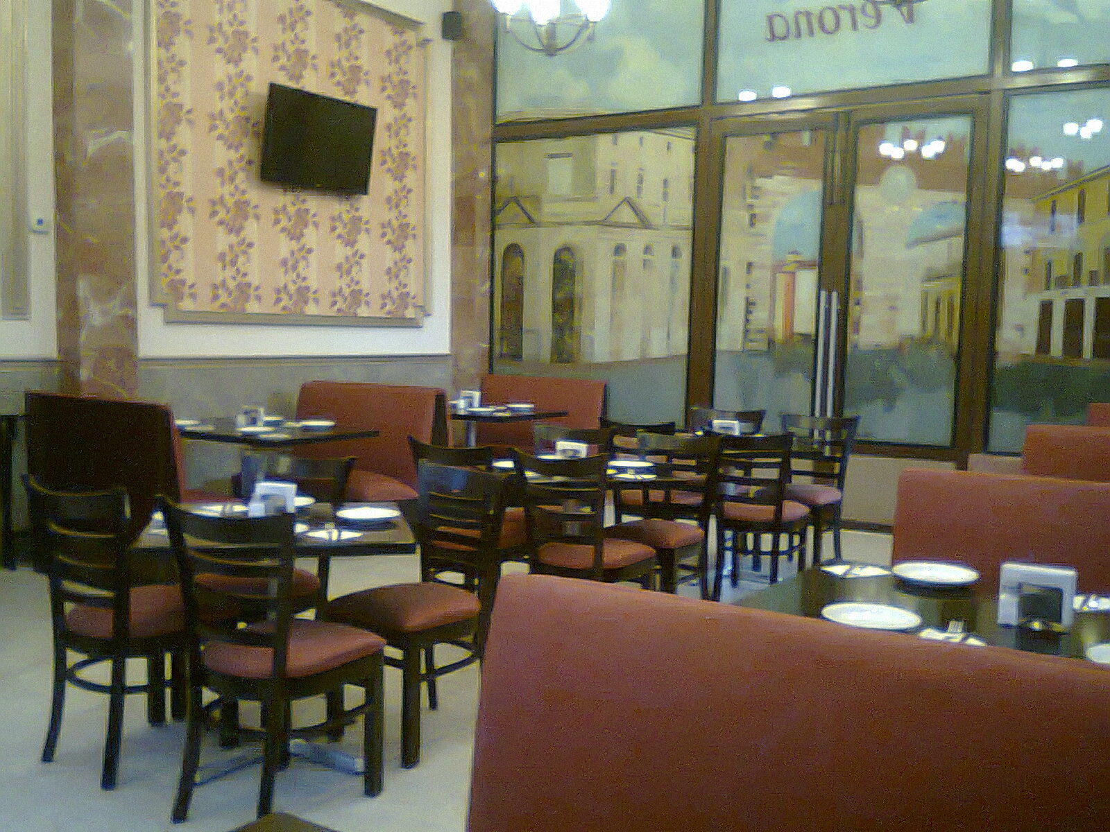 Hotel Victoria Мерида Экстерьер фото Interior of a typical café in the city