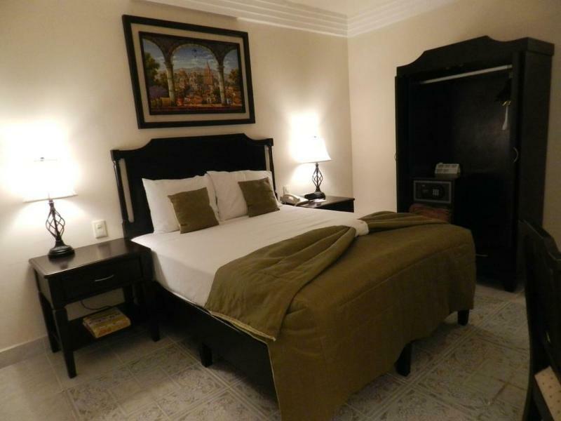 Hotel Victoria Мерида Экстерьер фото A bedroom in a hotel